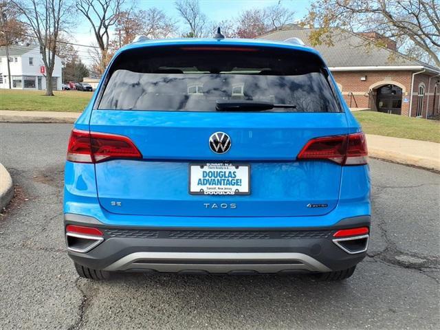 used 2022 Volkswagen Taos car, priced at $23,148