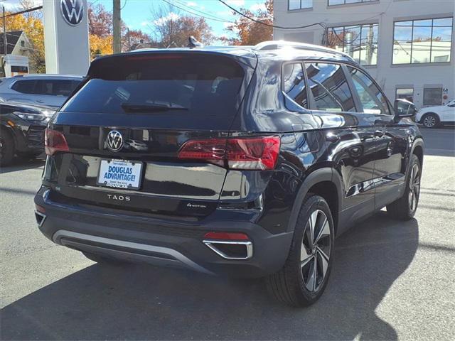used 2024 Volkswagen Taos car, priced at $25,396
