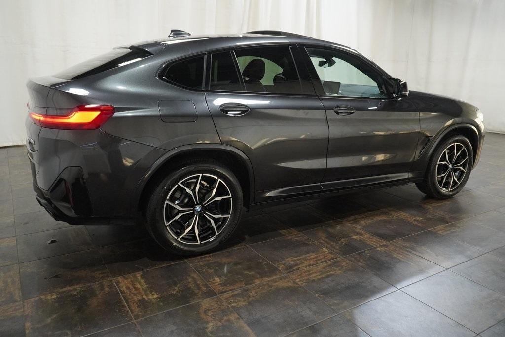 used 2024 BMW X4 car, priced at $55,118
