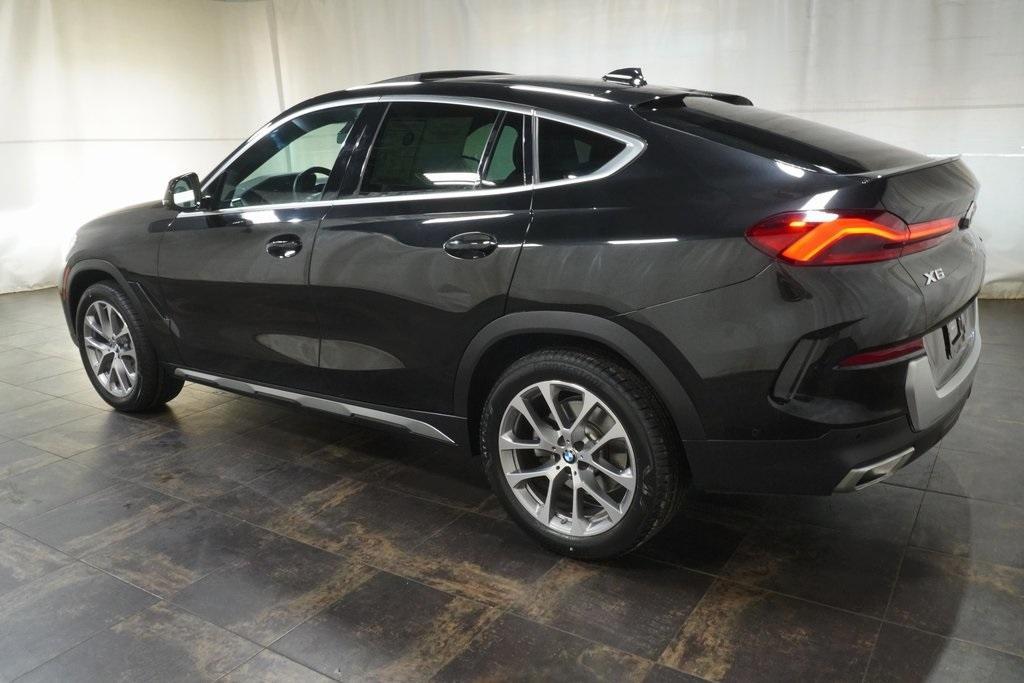 used 2023 BMW X6 car, priced at $55,670