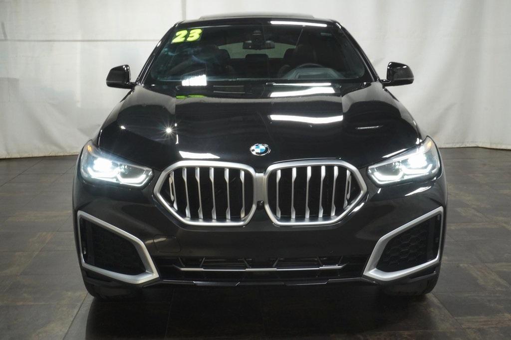 used 2023 BMW X6 car, priced at $55,670
