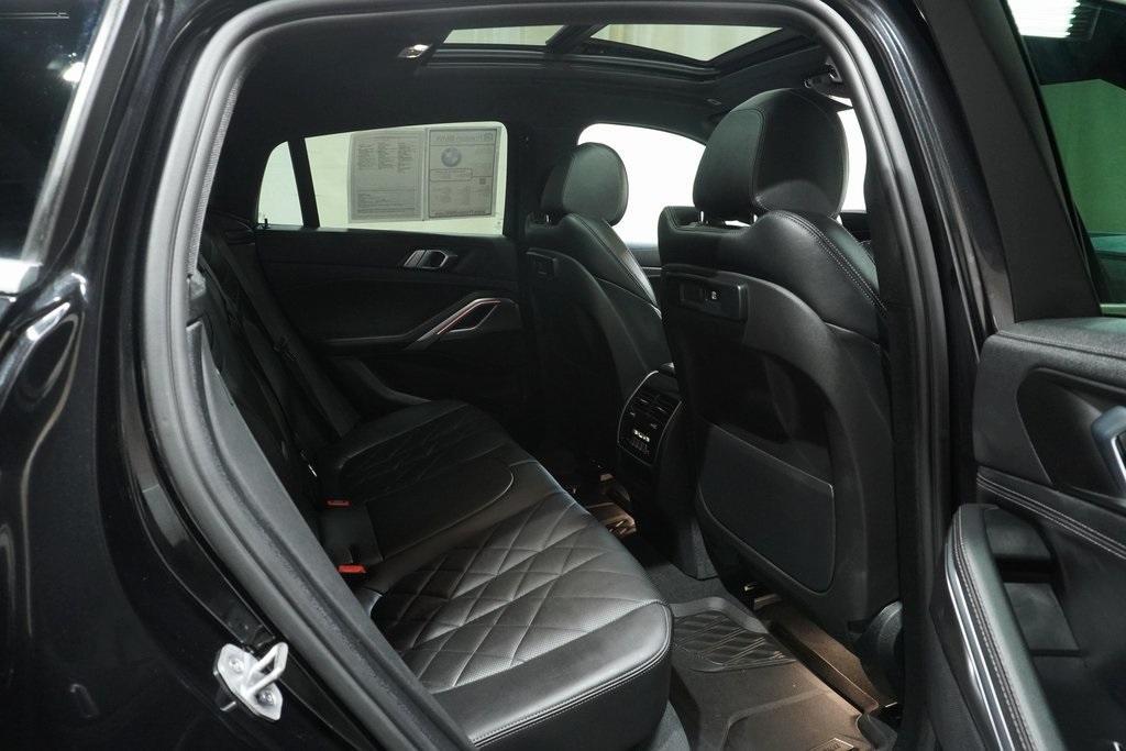 used 2023 BMW X6 car, priced at $55,670