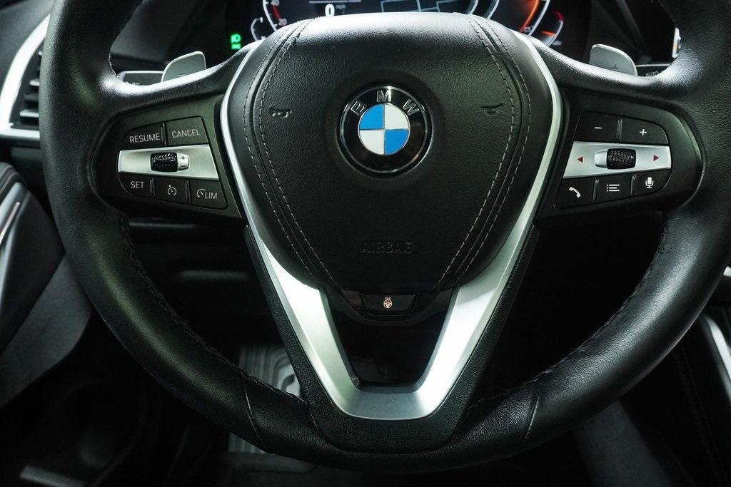 used 2023 BMW X6 car, priced at $55,670