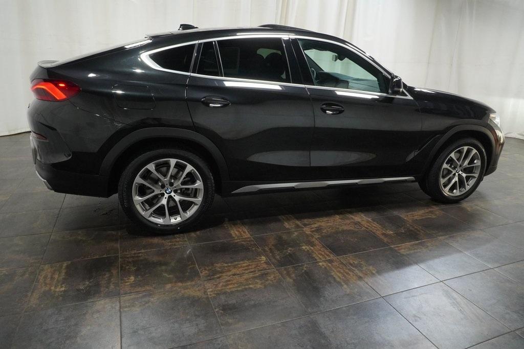 used 2023 BMW X6 car, priced at $55,670