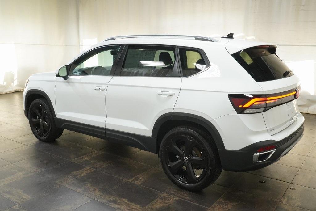 used 2025 Volkswagen Taos car, priced at $32,448