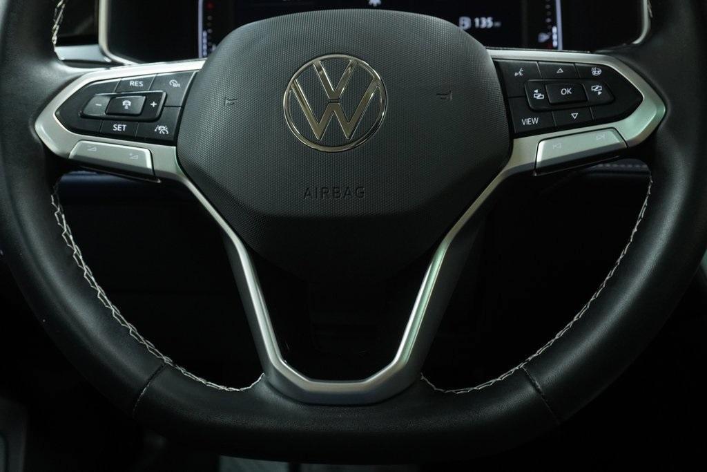 used 2025 Volkswagen Taos car, priced at $32,448