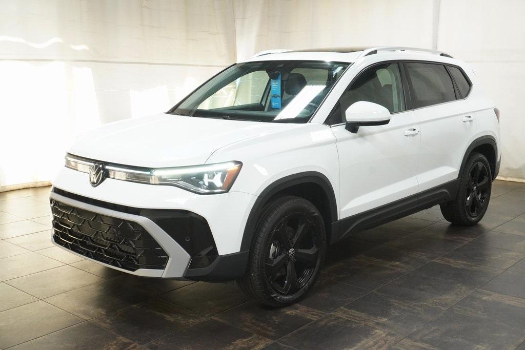used 2025 Volkswagen Taos car, priced at $32,448