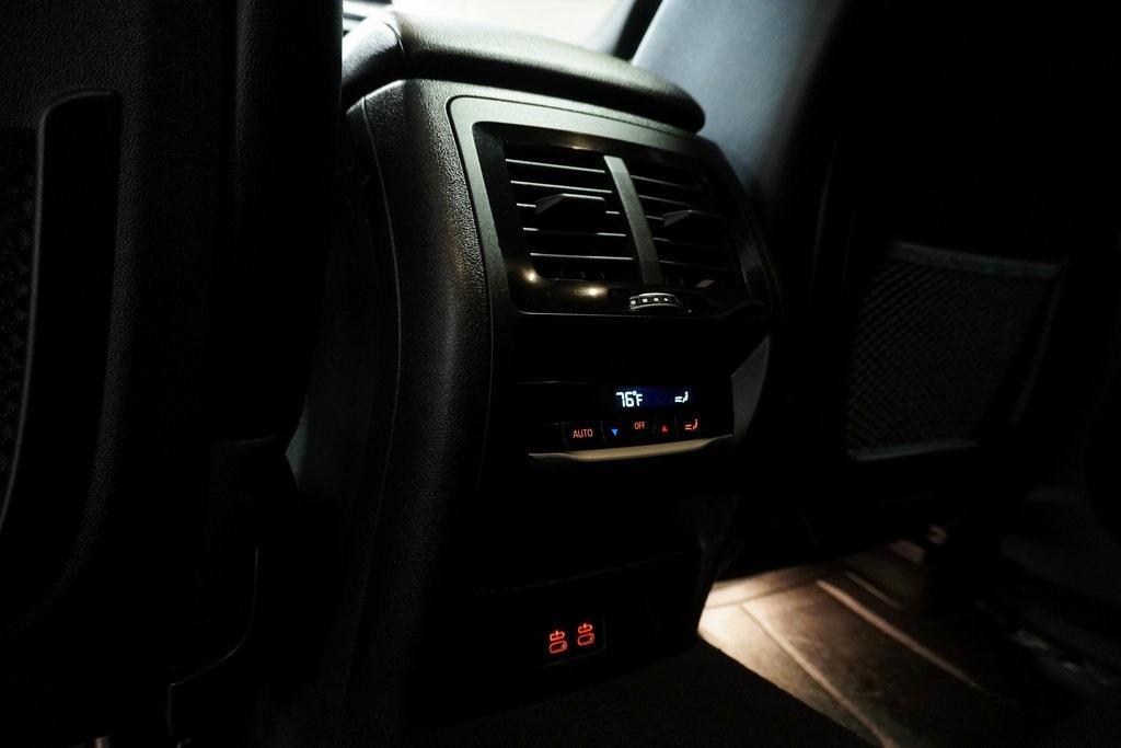 used 2023 BMW X4 car, priced at $45,263