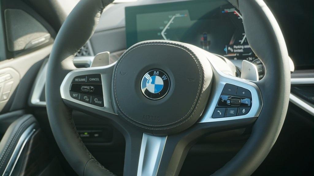 new 2025 BMW X6 car, priced at $83,235