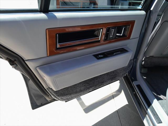 used 1990 Cadillac Fleetwood car, priced at $12,995