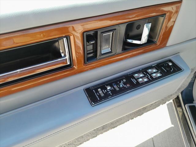used 1990 Cadillac Fleetwood car, priced at $12,995