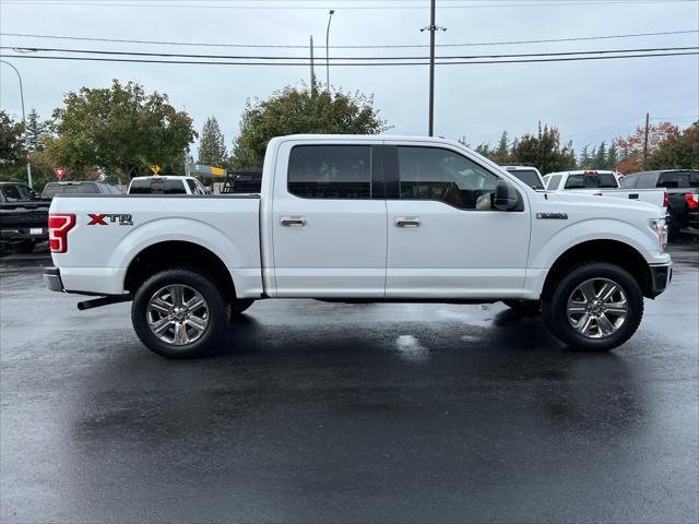 used 2018 Ford F-150 car, priced at $19,850