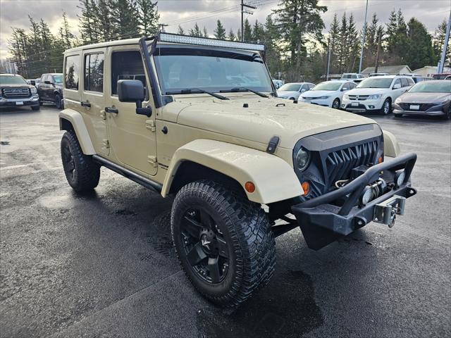 used 2011 Jeep Wrangler Unlimited car, priced at $14,850