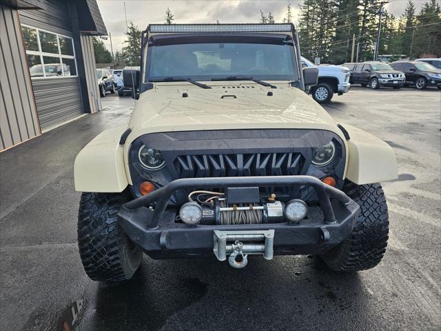 used 2011 Jeep Wrangler Unlimited car, priced at $14,850