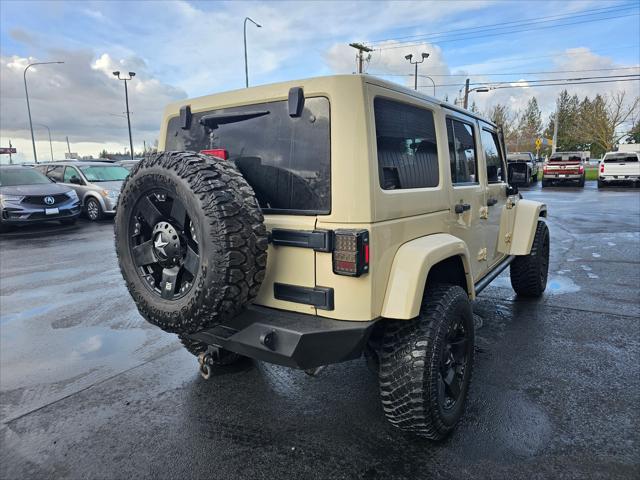 used 2011 Jeep Wrangler Unlimited car, priced at $14,850