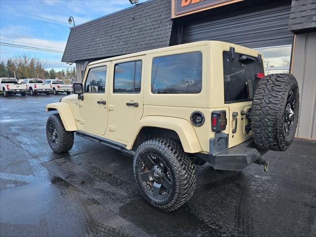 used 2011 Jeep Wrangler Unlimited car, priced at $14,850