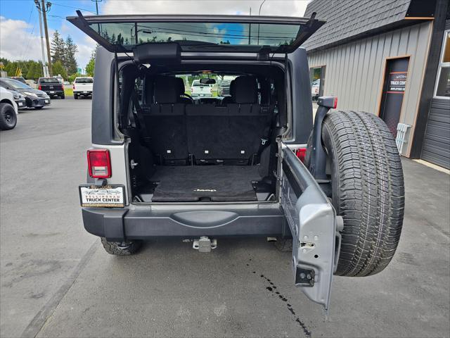 used 2014 Jeep Wrangler Unlimited car, priced at $18,850