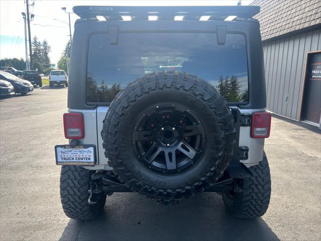 used 2013 Jeep Wrangler Unlimited car, priced at $21,850