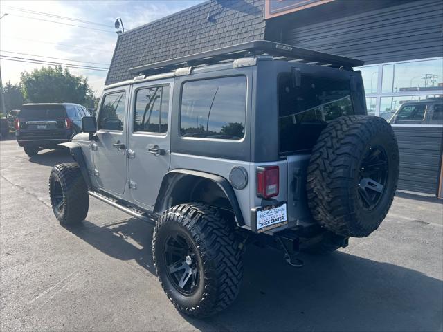used 2013 Jeep Wrangler Unlimited car, priced at $21,850