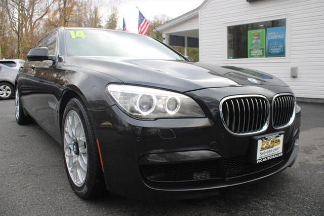 used 2014 BMW 750 car, priced at $16,995