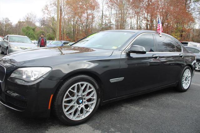 used 2014 BMW 750 car, priced at $16,995