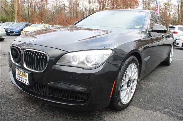 used 2014 BMW 750 car, priced at $16,995