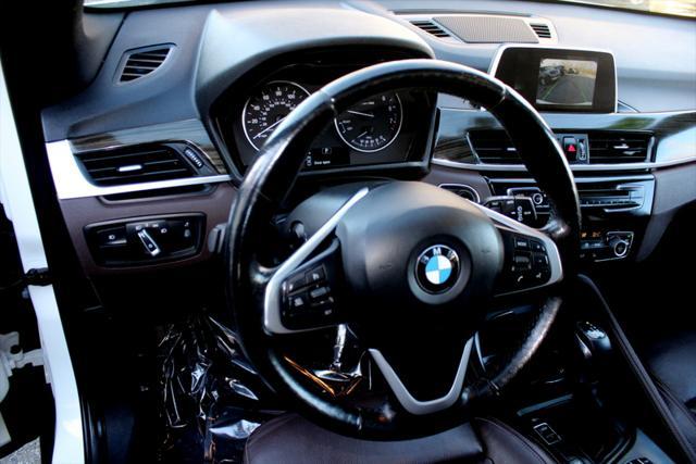 used 2018 BMW X1 car, priced at $12,994