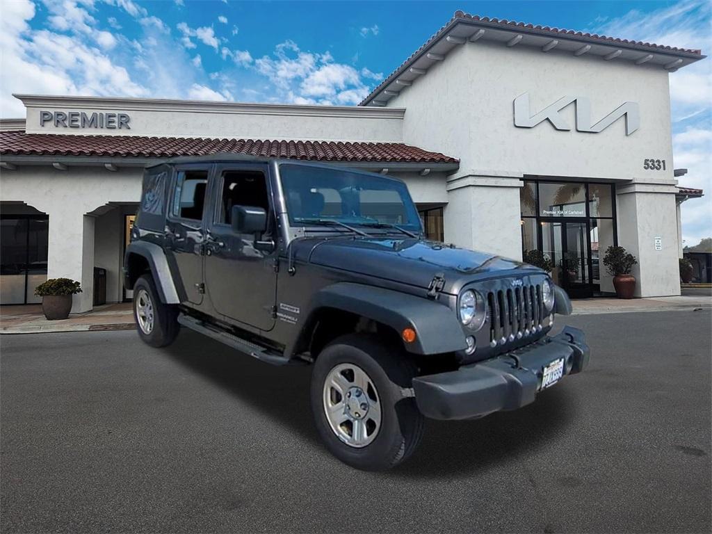 used 2017 Jeep Wrangler Unlimited car, priced at $18,290