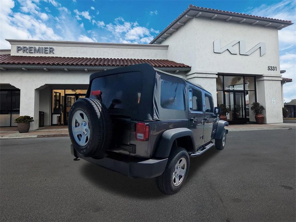 used 2017 Jeep Wrangler Unlimited car, priced at $18,290
