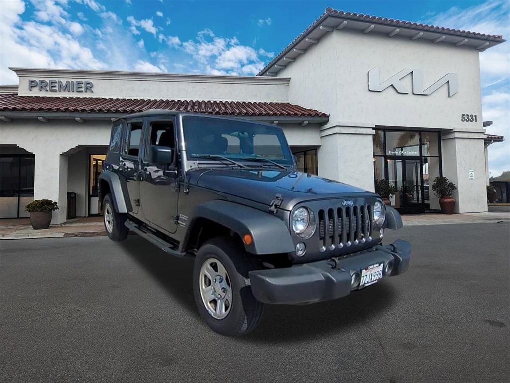 used 2017 Jeep Wrangler Unlimited car, priced at $18,290