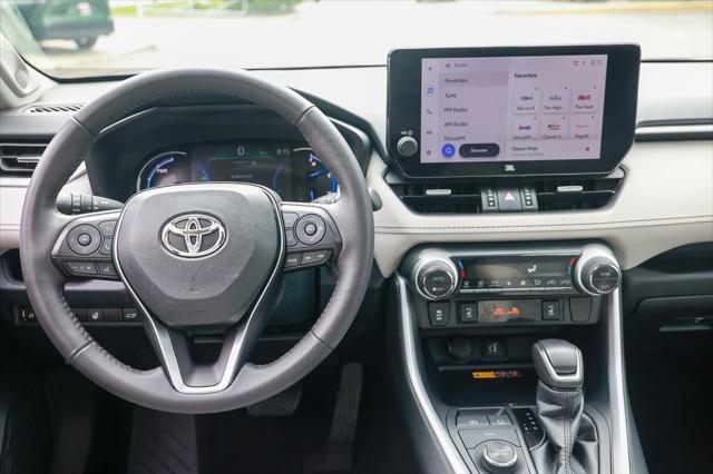 used 2023 Toyota RAV4 Hybrid car, priced at $34,999