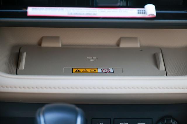 used 2024 Toyota Highlander Hybrid car, priced at $52,999