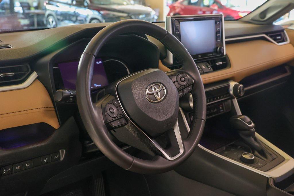 used 2021 Toyota RAV4 Hybrid car, priced at $33,499