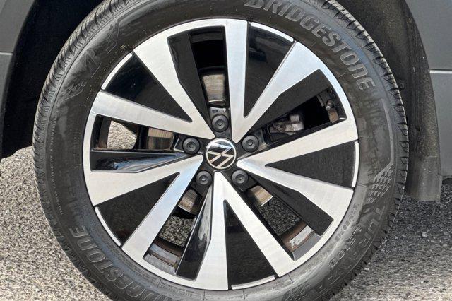 used 2023 Volkswagen Taos car, priced at $18,896