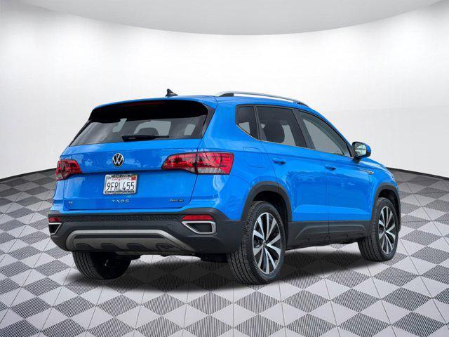 used 2023 Volkswagen Taos car, priced at $18,896