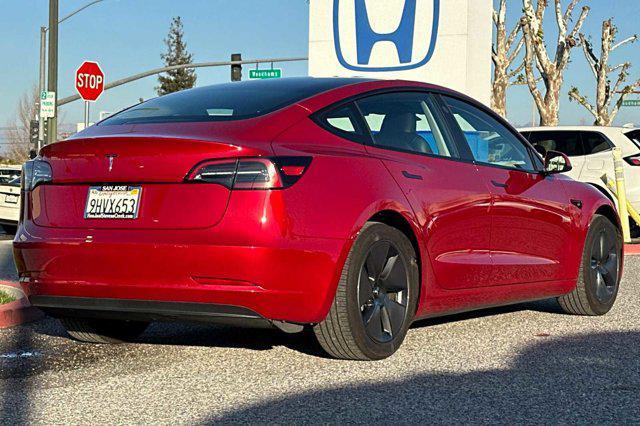 used 2023 Tesla Model 3 car, priced at $26,498