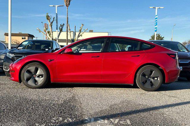 used 2023 Tesla Model 3 car, priced at $26,498