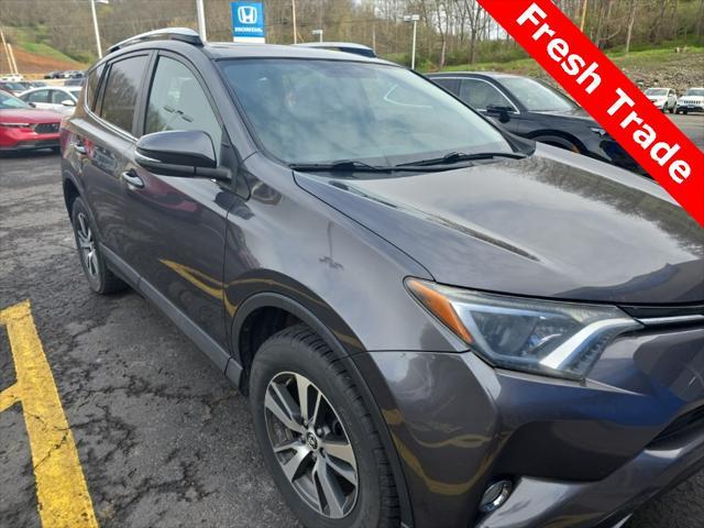 used 2016 Toyota RAV4 car, priced at $14,000