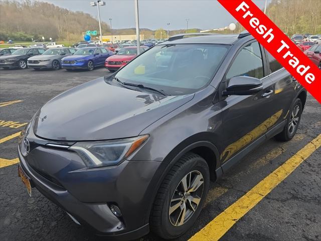 used 2016 Toyota RAV4 car, priced at $14,000