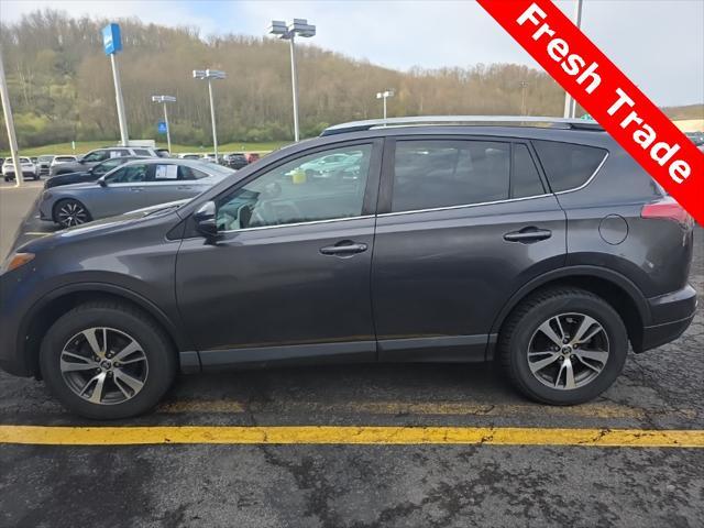 used 2016 Toyota RAV4 car, priced at $14,000