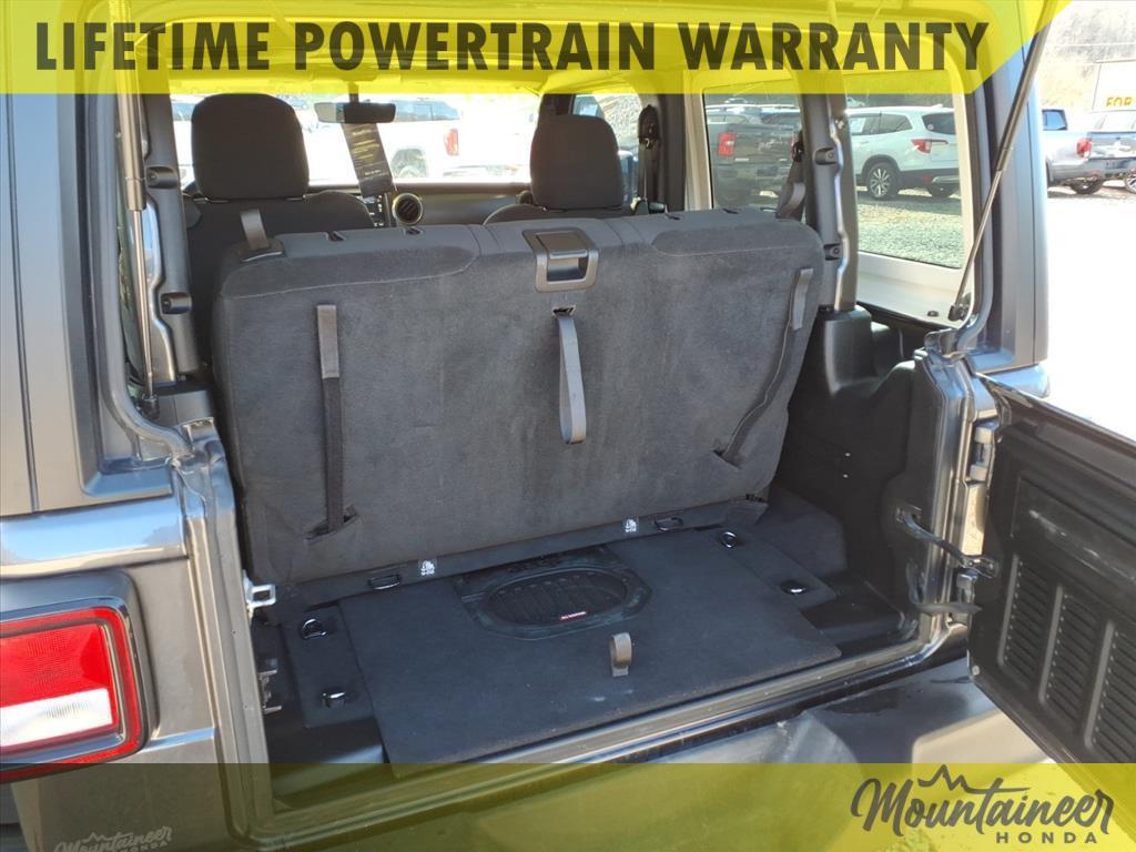 used 2023 Jeep Wrangler car, priced at $23,900