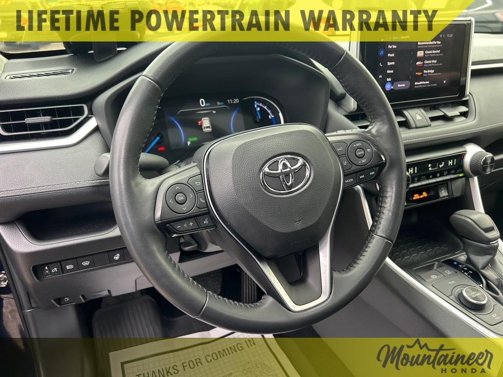 used 2023 Toyota RAV4 Hybrid car, priced at $29,700