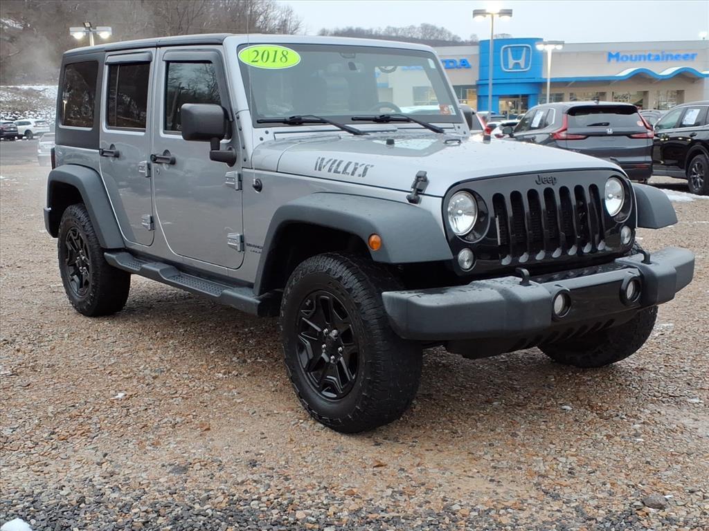 used 2018 Jeep Wrangler JK Unlimited car, priced at $19,000