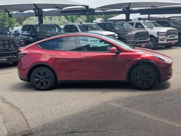 used 2025 Tesla Model Y car, priced at $35,499