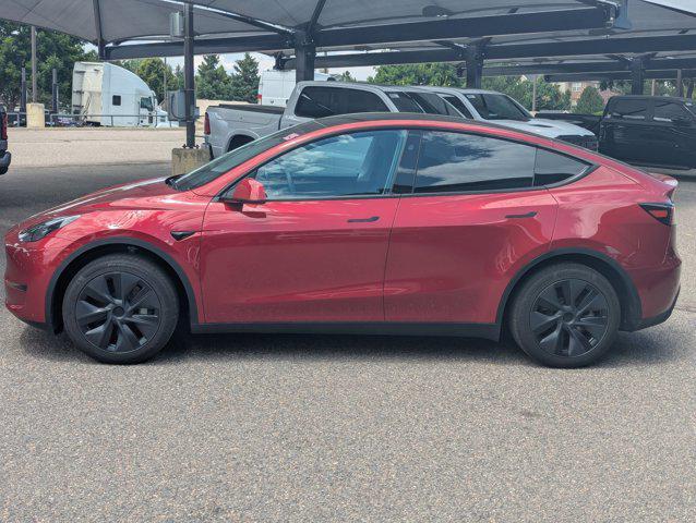 used 2025 Tesla Model Y car, priced at $35,499