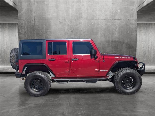 used 2013 Jeep Wrangler Unlimited car, priced at $20,999