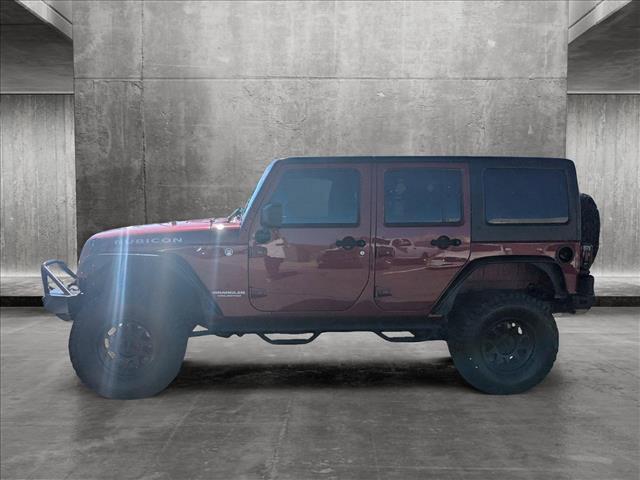 used 2013 Jeep Wrangler Unlimited car, priced at $20,999