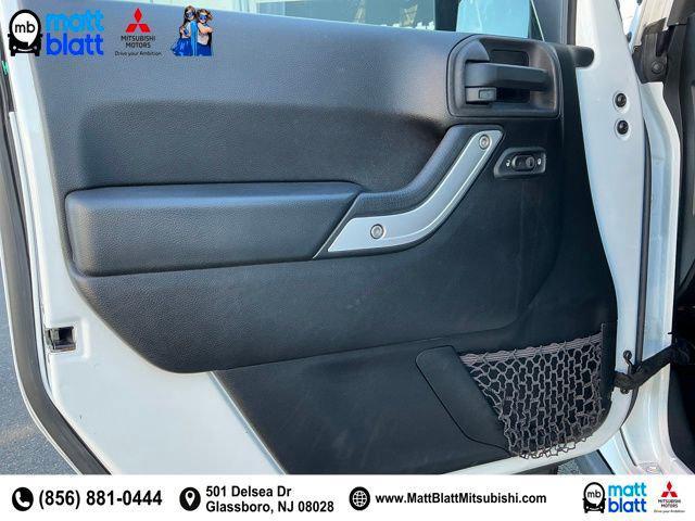 used 2015 Jeep Wrangler Unlimited car, priced at $23,999