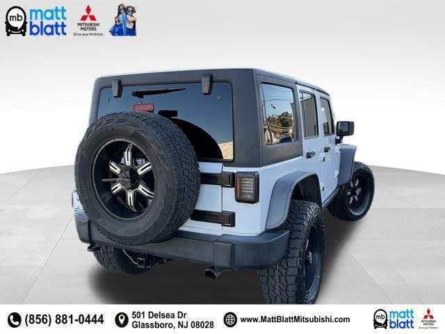 used 2015 Jeep Wrangler Unlimited car, priced at $23,999