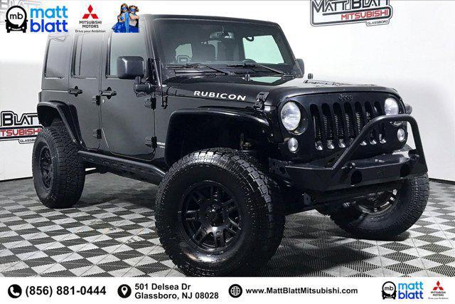 used 2015 Jeep Wrangler Unlimited car, priced at $21,999